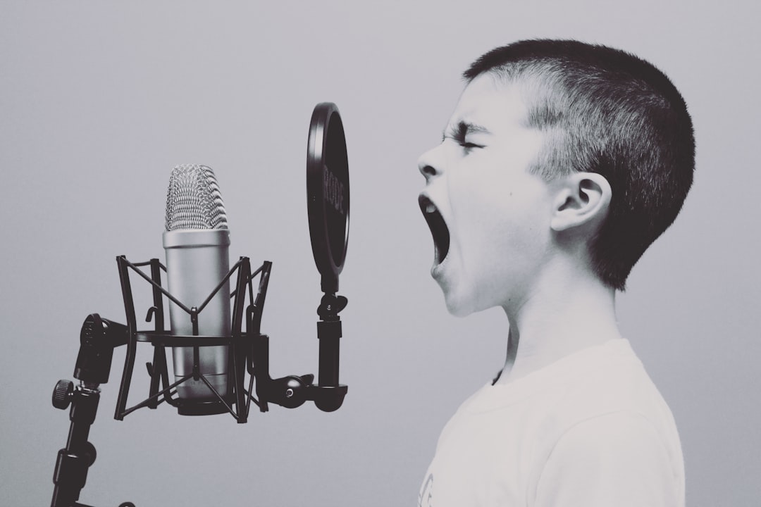 FAQ by Make a Song boy singing on microphone with pop filter